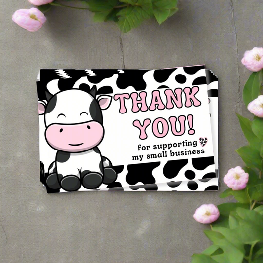 Cartoon cow with 'Thank You! for supporting my small business' text on a cow print background